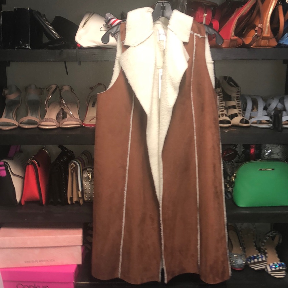 BCBG cow/ sheep Vest. Mid length